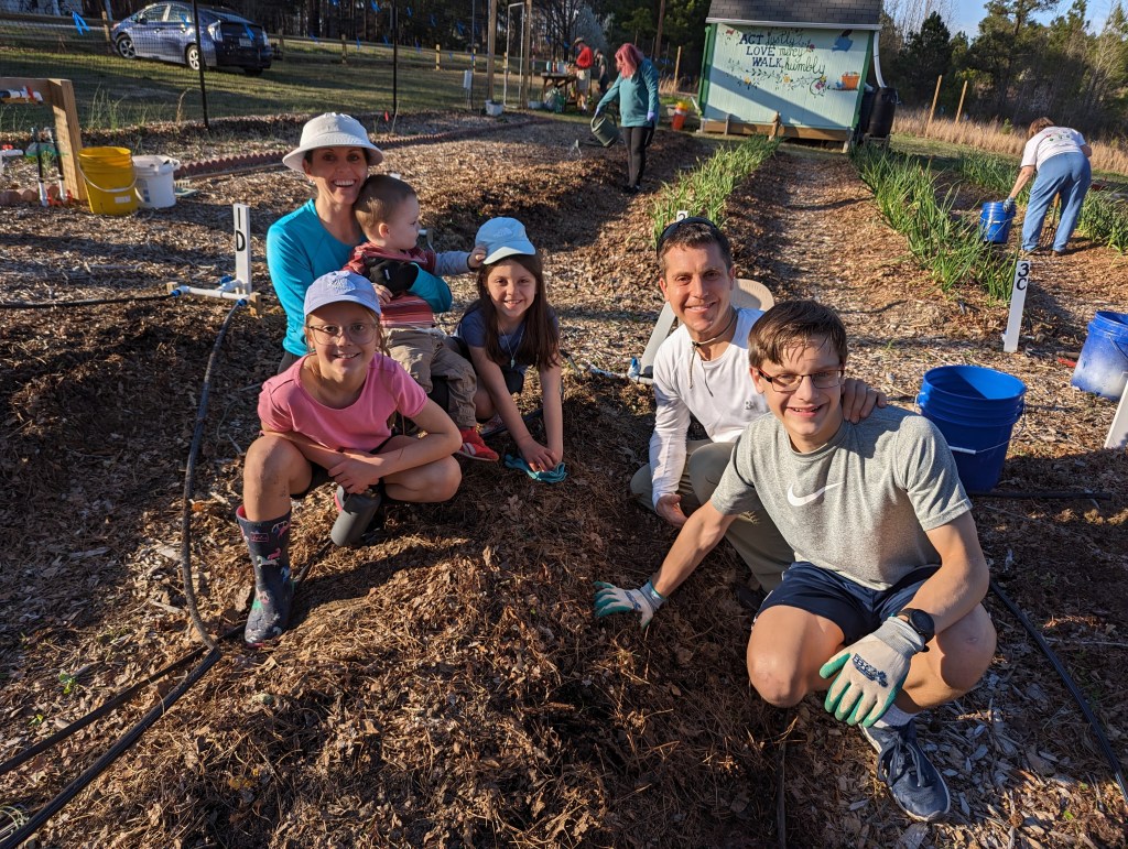 Family working in garden