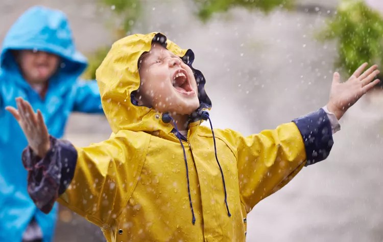 Child enjoying rain